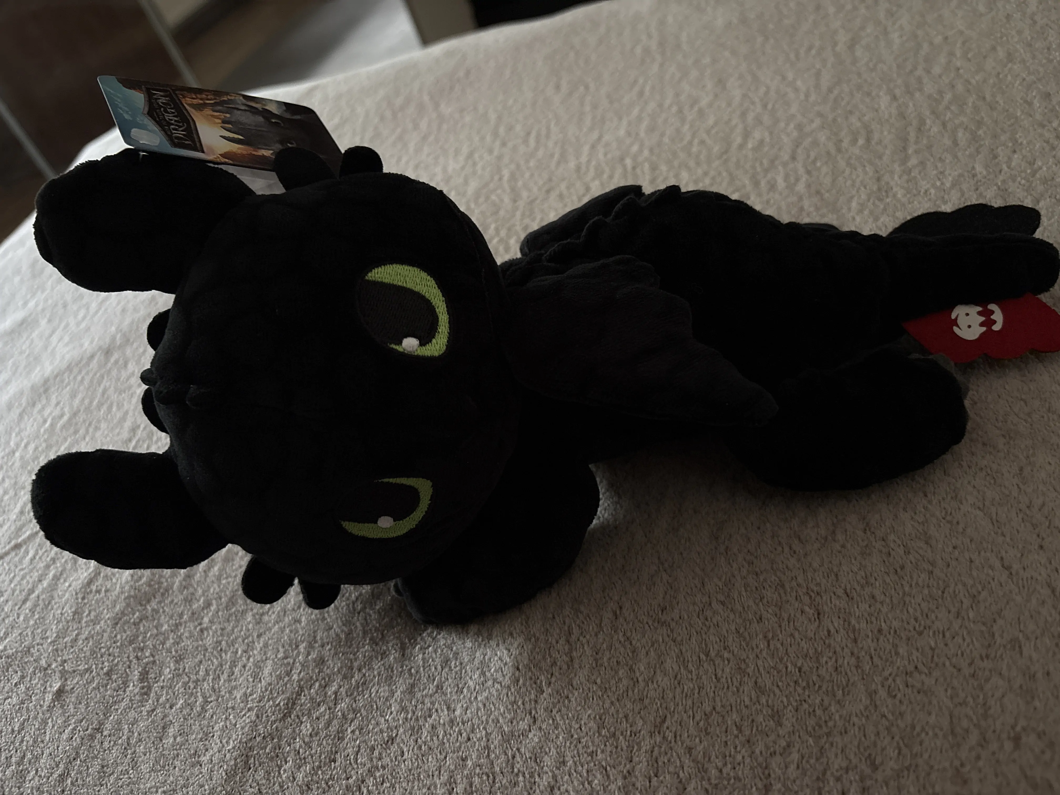 Kako izuriti svojega zmaja Plišasta figura Toothless Lying Version 30 cm fotografija izdelka