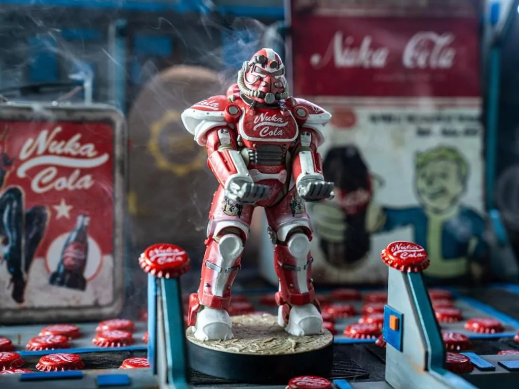 Fallout Nuka Cola Power Armour Cable Guys držalo za igralni plošček in stojalo za telefon fotografija izdelka