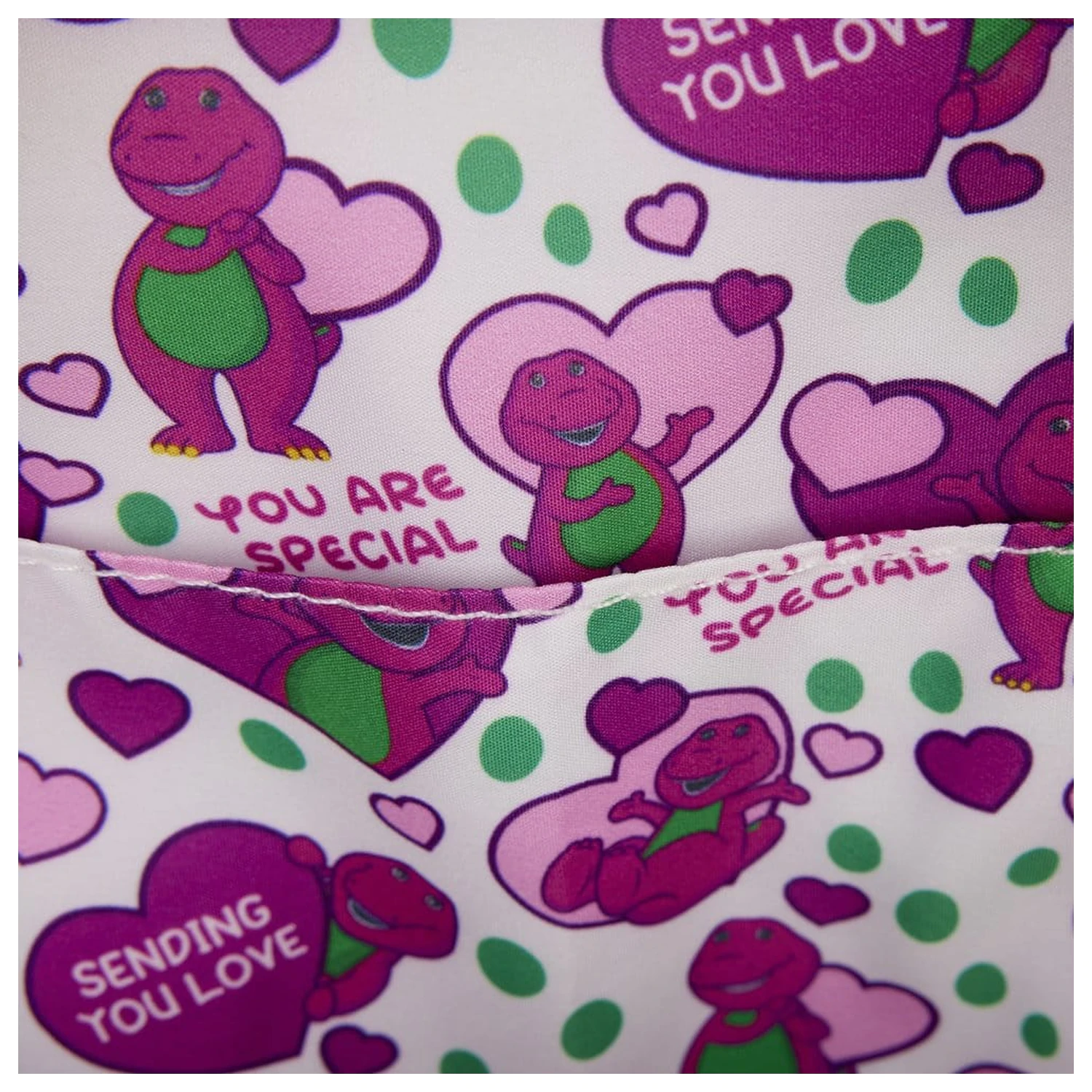 Mattel by Loungefly mini nahrbtnik Barney fotografija izdelka