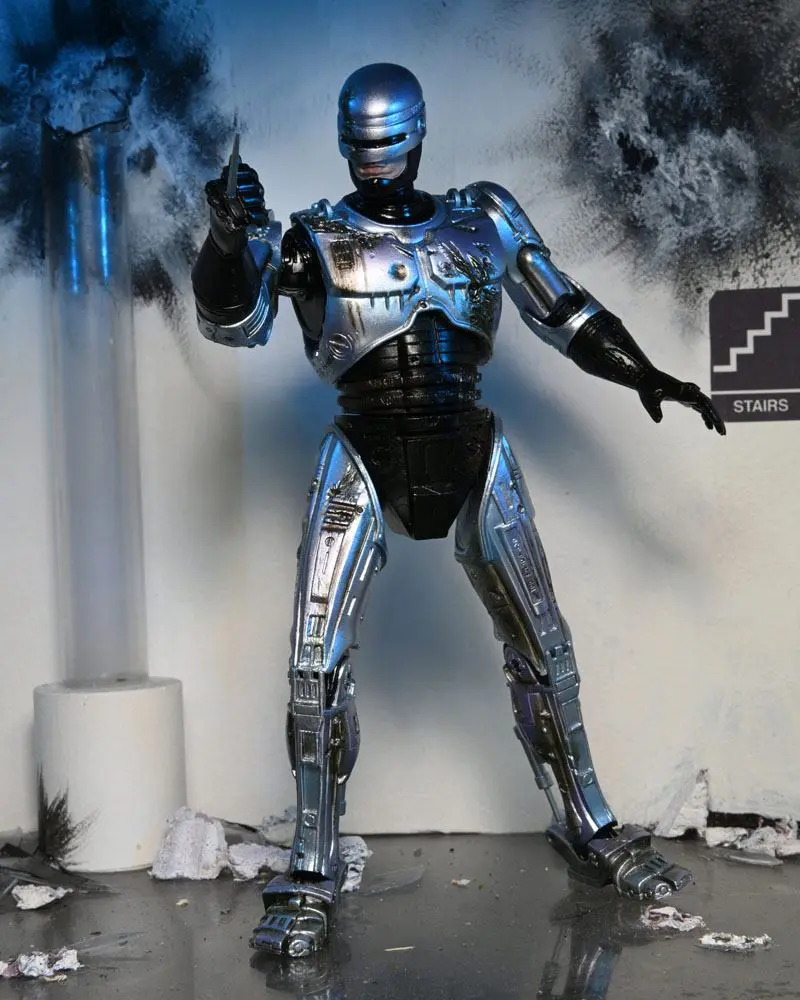 Akcijska figura RoboCop Ultimate Battle Damaged RoboCop s stolom 18 cm fotografija izdelka