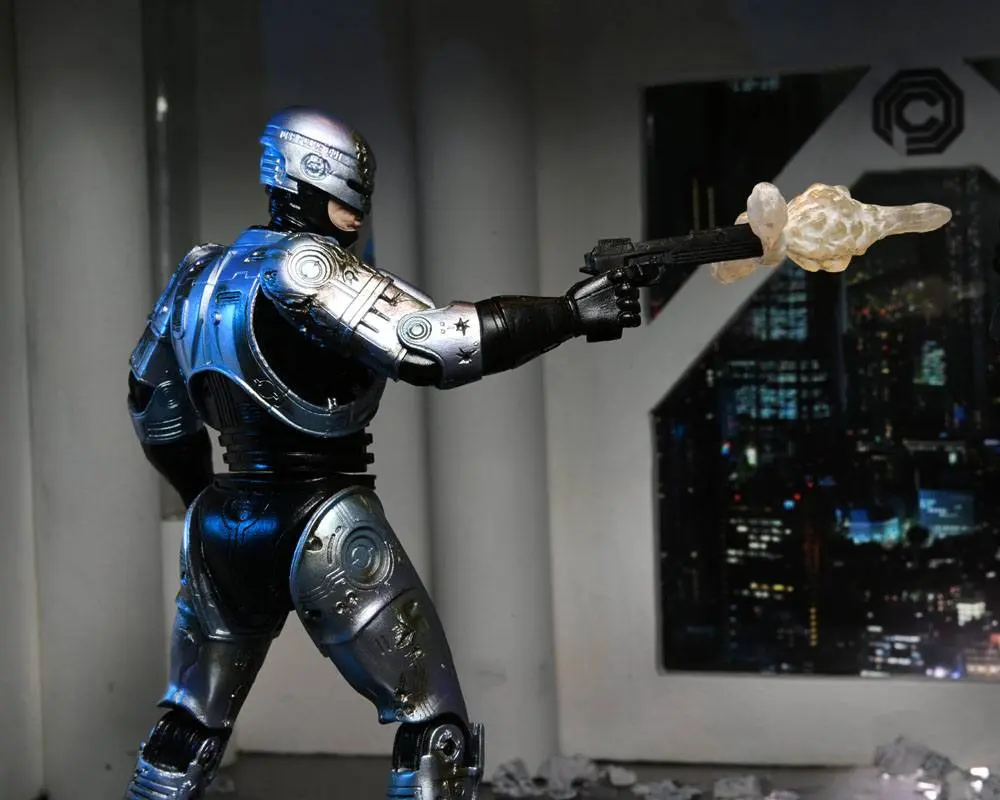 Akcijska figura RoboCop Ultimate Battle Damaged RoboCop s stolom 18 cm fotografija izdelka