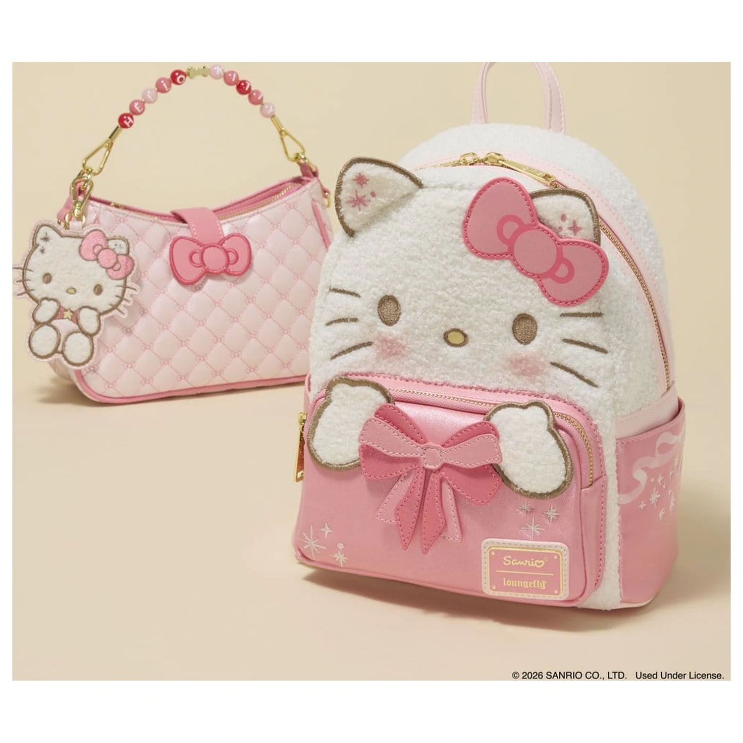 Sanrio by Loungefly torbica za nošenje preko telesa s perlastim ročajem in obeskom za torbo Hello Kitty Quilted fotografija izdelka